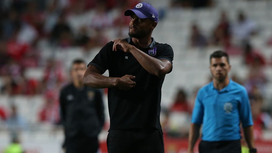 Vincent Kompany watches his Anderlecht side in action