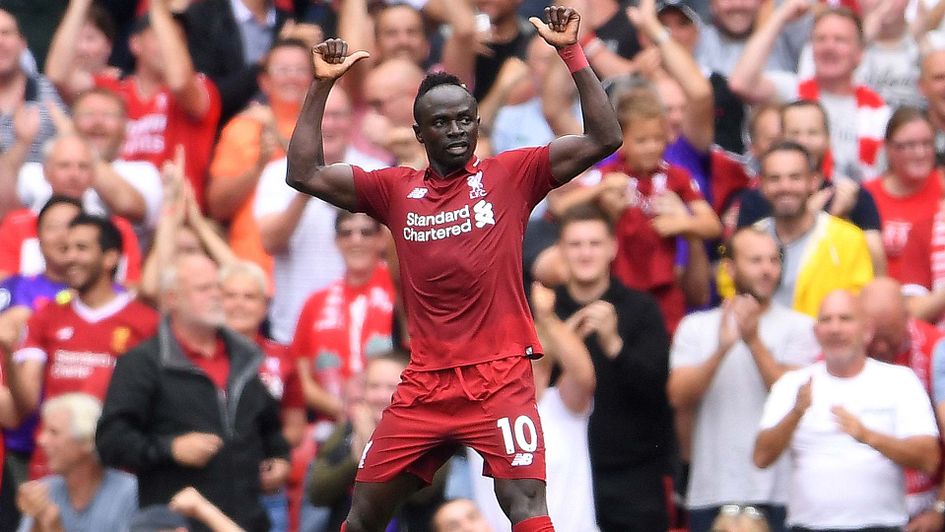 Sadio Mane celebrates scoring for Liverpool