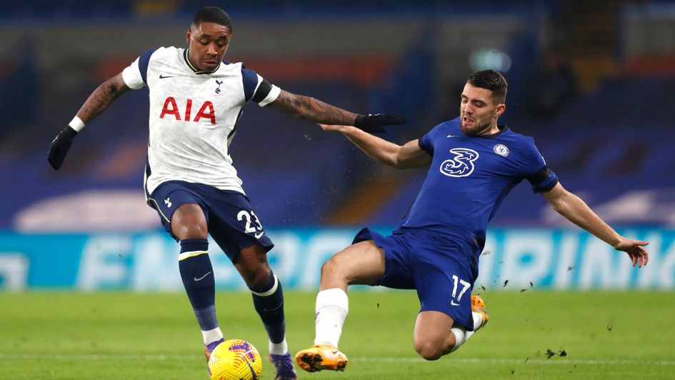 Mateo Kovacic looks to stop Steven Bergwijn
