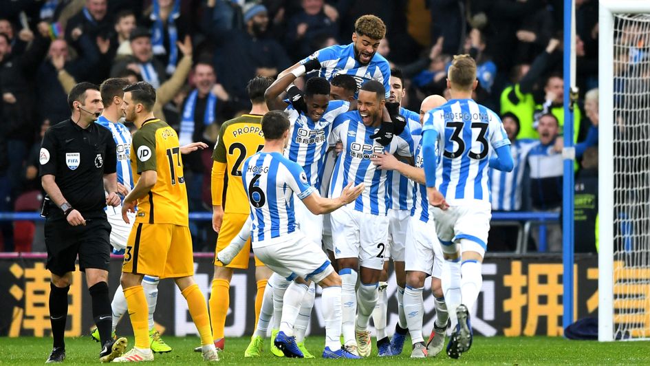 Delight for Huddersfield: Town celebrate Zanka's goal v Brighton
