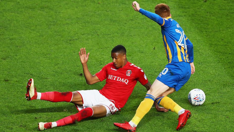 Jon Nolan in possession for Shrewsbury Town