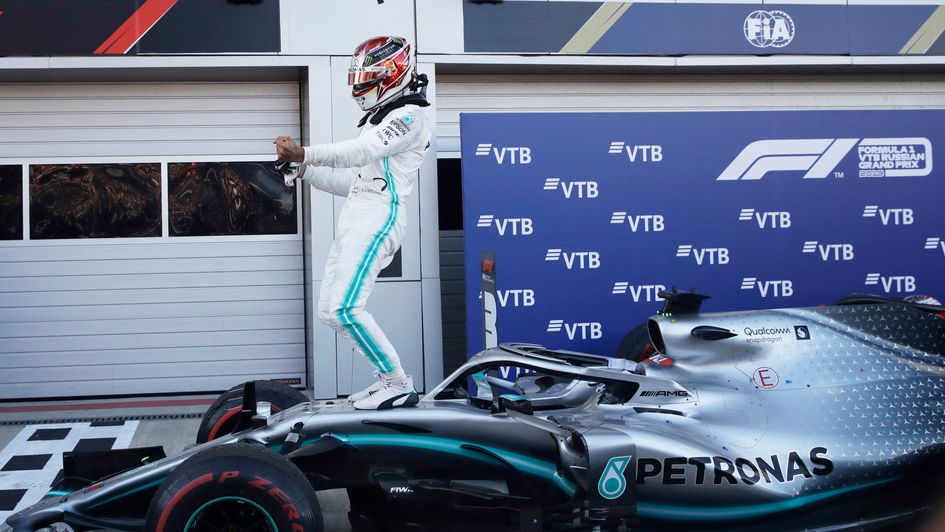 Lewis Hamilton celebrates his win in Russia