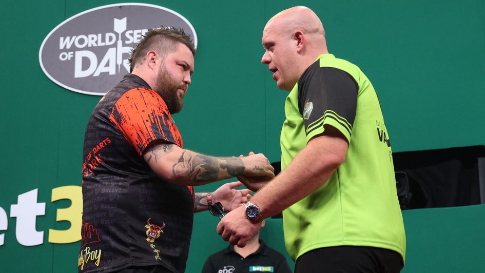 Michael Smith and Michael van Gerwen (Picture: Ed Mulholland/PDC)