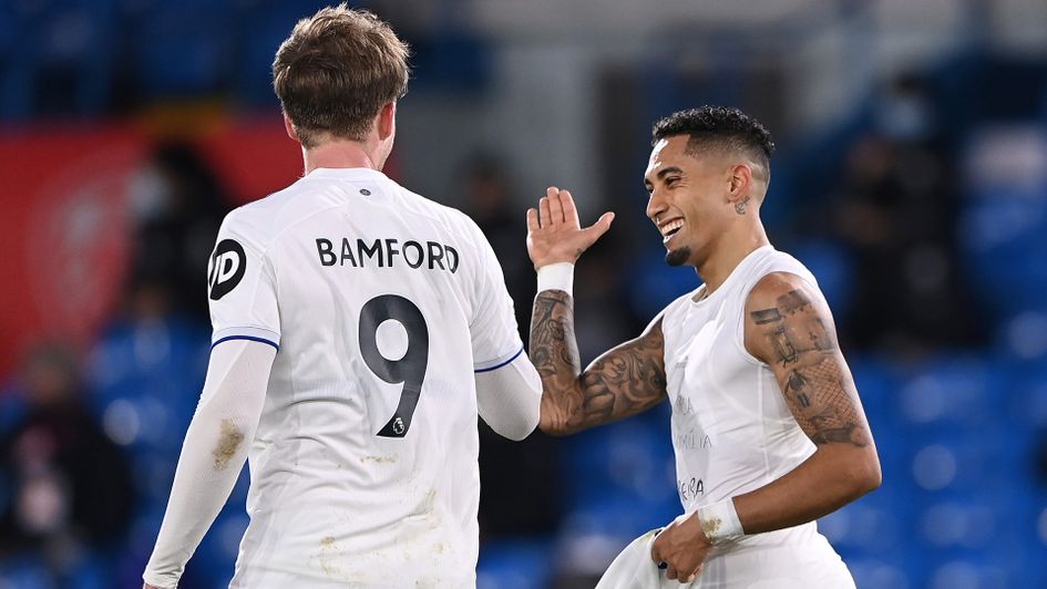 Raphinha celebrates with Patrick Bamford