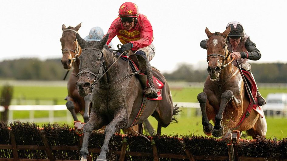 Teahupoo (right) and Klassical Dream jump the last, with Honeysuckle back in third