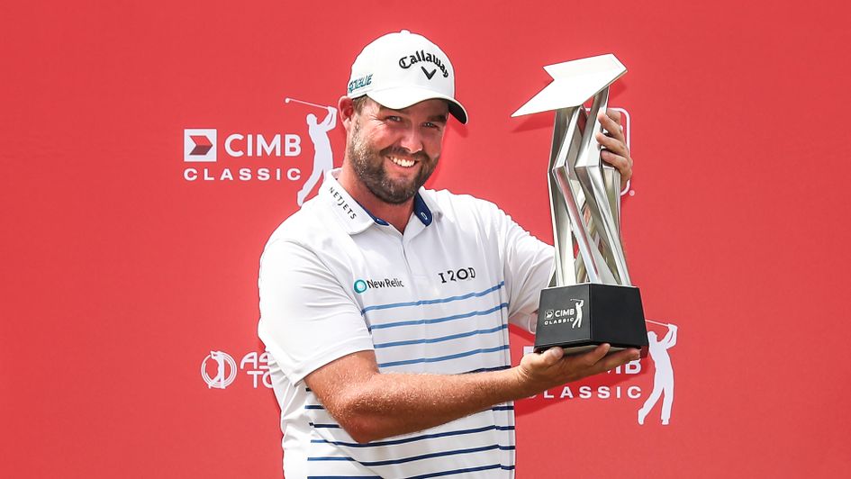 Marc Leishman with the CIMB Classic trophy