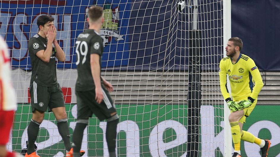 Harry Maguire (left) reacts as Man Utd concede again against RB Leipzig