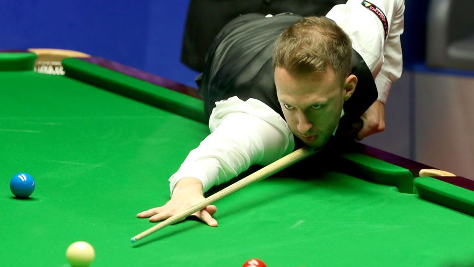 Judd Trump in action against John Higgins
