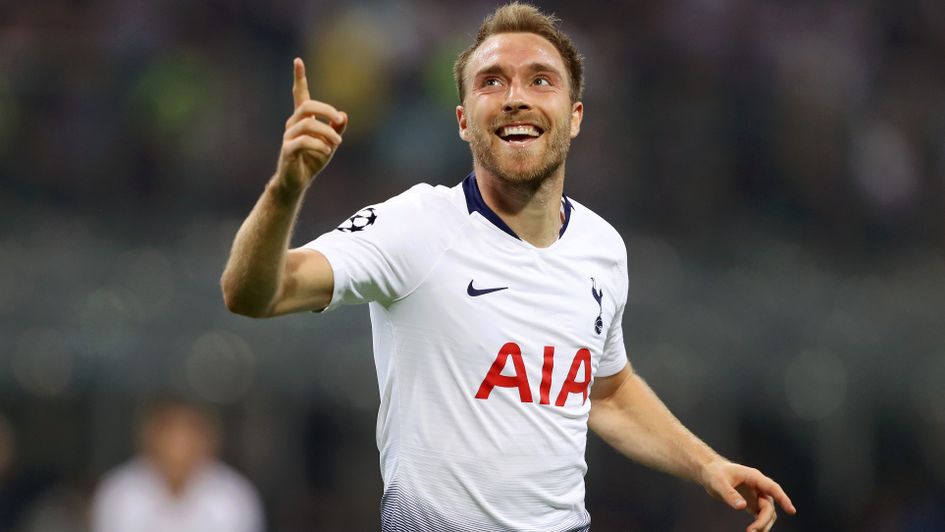 Christian Eriksen: The Danish midfielder celebrates after scoring for Spurs in the Champions League