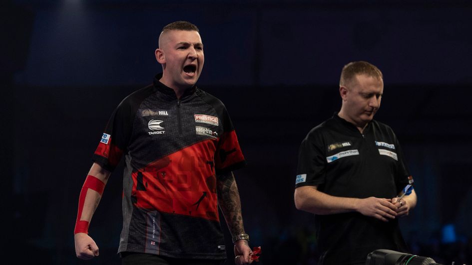 Nathan Aspinall celebrates against Joe Murnan (Picture: Lawrence Lustig/PDC)