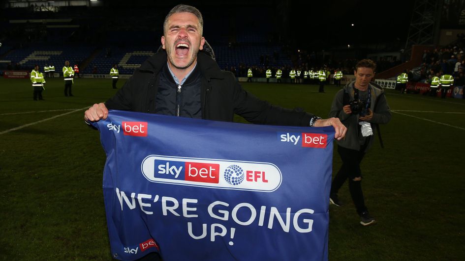 Ryan Lowe celebrates after Bury secure promotion
