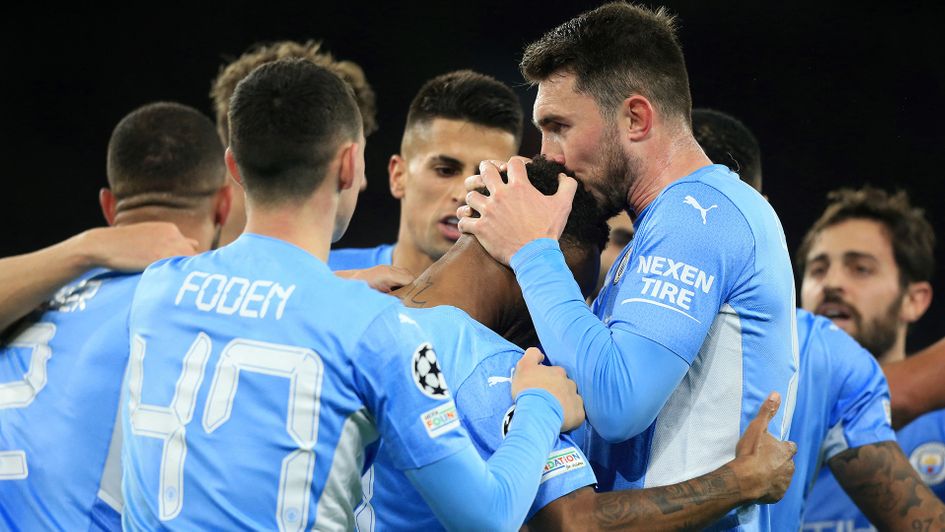 Manchester City celebrate Raheem Sterling's goal against Club Brugge