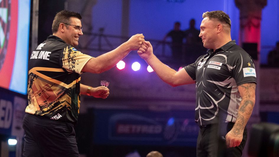 Jose de Sousa and Gerwyn Price (Picture: Lawrence Lustig/PDC)