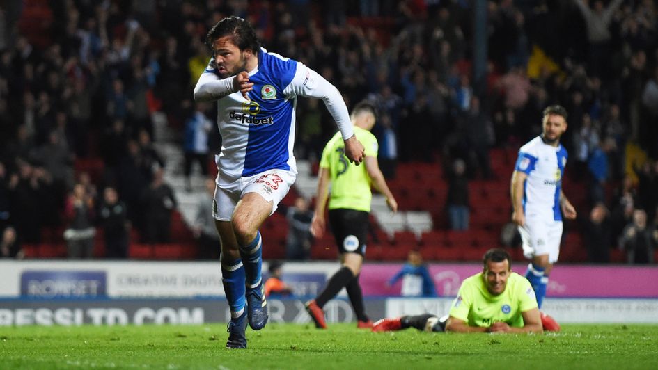 Bradley Dack celebrates the first of his two goals for Blackburn against Peterborough