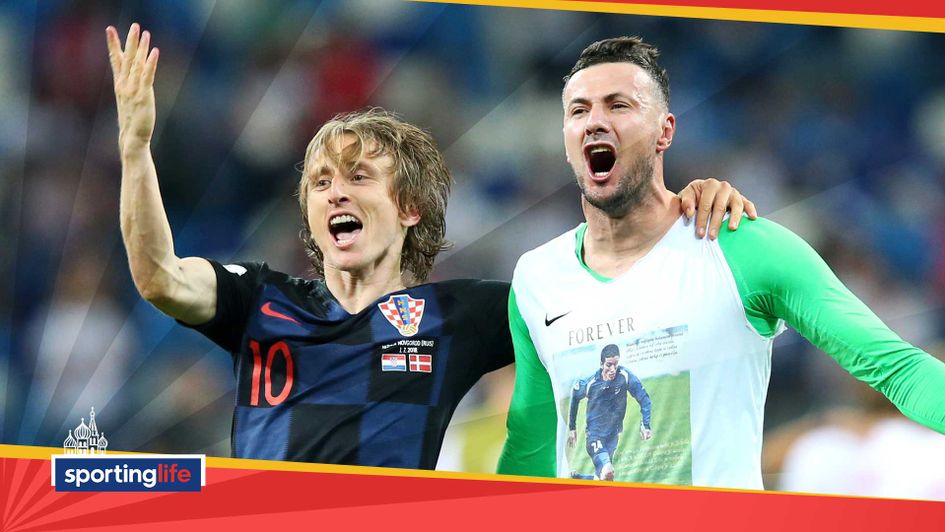 Luka Modric celebrates with Danijel Subasic