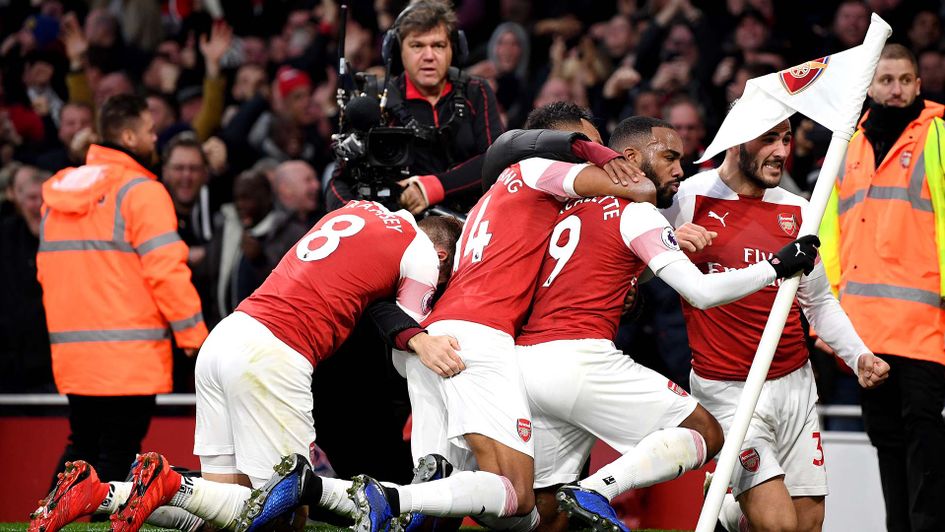 Arsenal celebrate their north London derby win over Tottenham