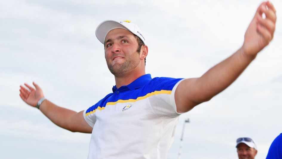 Jon Rahm celebrates after beating Tiger Woods on his Ryder Cup debut