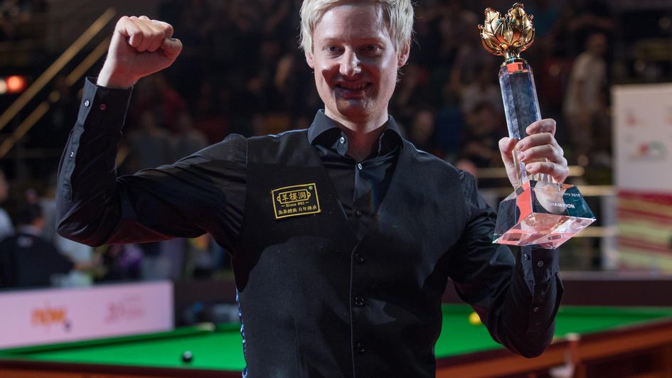 Neil Robertson celebrates