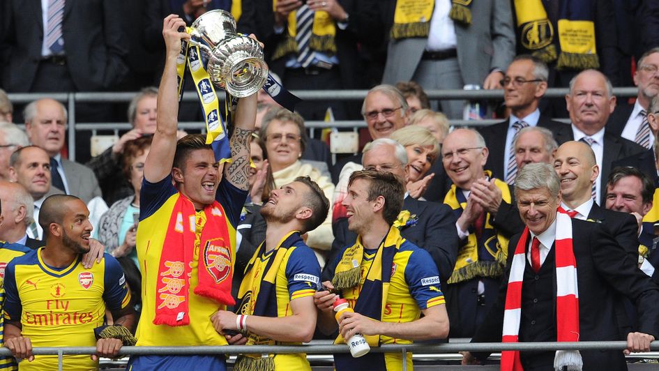 Arsenal would defend their FA Cup crown with a win over Aston Villa in 2015