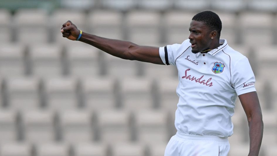 West Indies captain Jason Holder celebrates taking one of his six wickets
