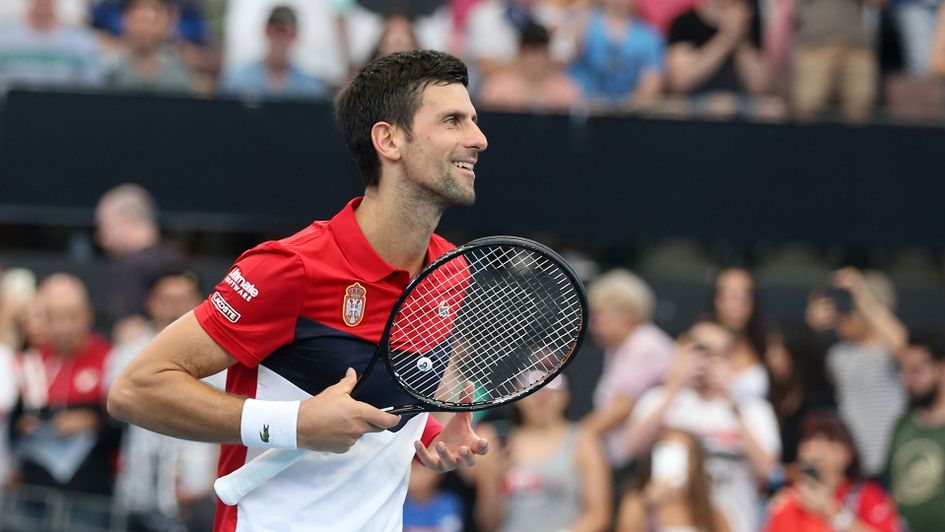 Novak Djokovic celebrates beating Chile's Christian Garin