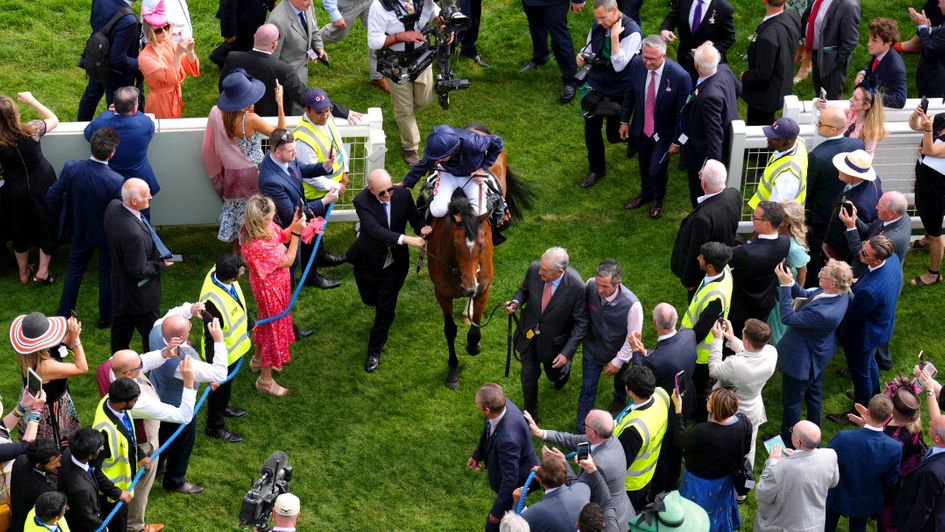 Tuesday comes into the winner's enclosure after the Oaks
