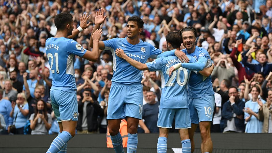 Manchester City celebrate beating Norwich