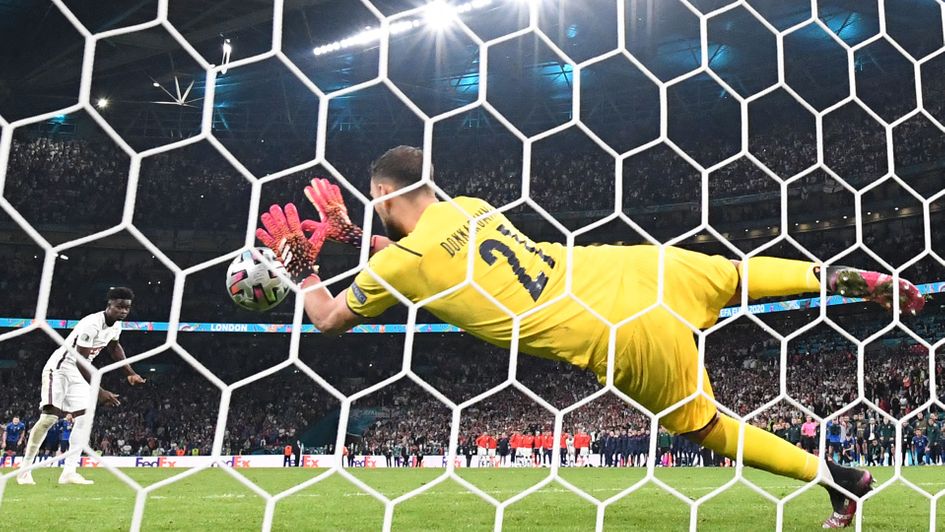 Gianluigi Donnarumma saves Bukayo Saka's penalty