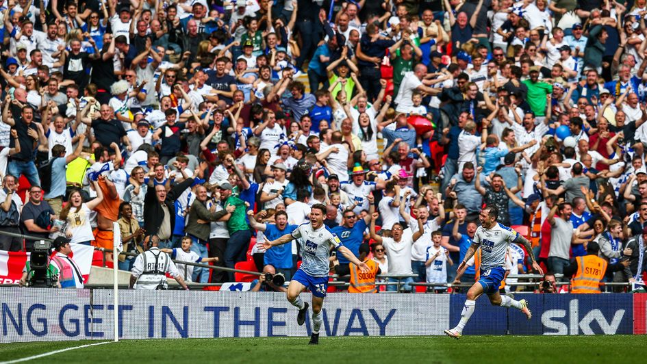 Connor Jennings celebrates his winner for Tranmere in the Sky Bet League Two play-off final