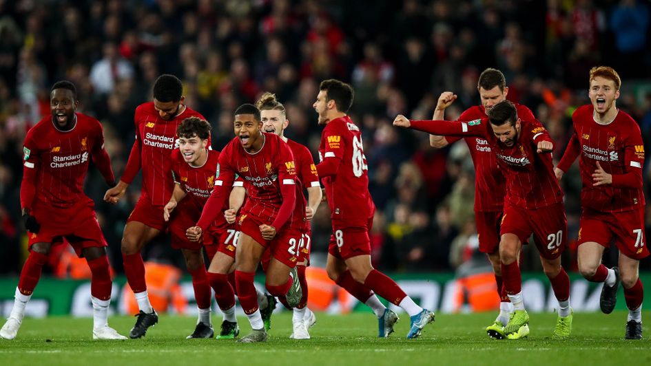 Liverpool celebrate their penalty shoot-out win over Arsenal