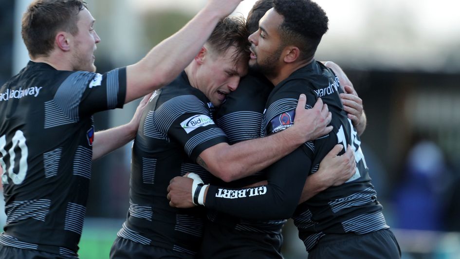 Newcastle Falcons' Zach Kibirige is congratulated