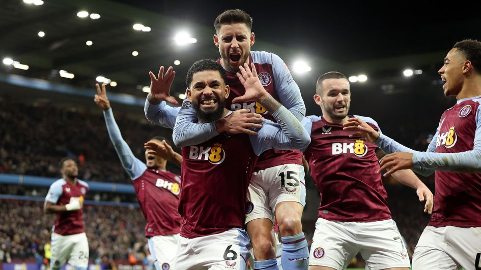 Douglas Luiz celebrates