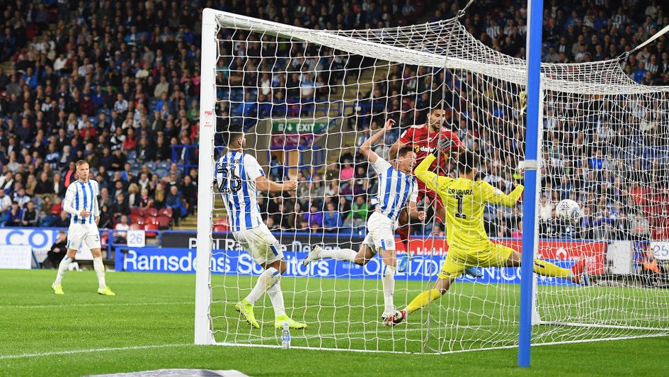 Aleksandar Mitrovic puts Fulham ahead against Huddersfield