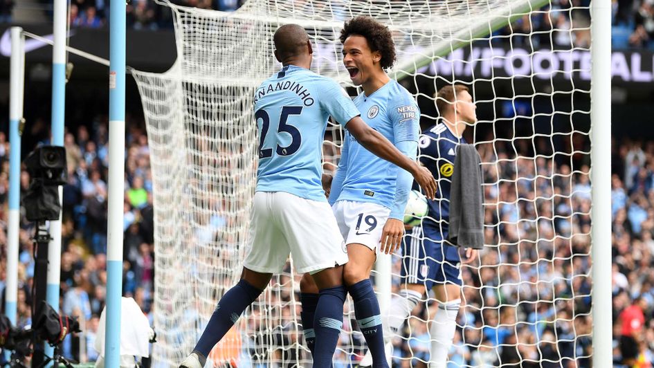 Leroy Sane celebrates his goal for Manchester City against Fulham