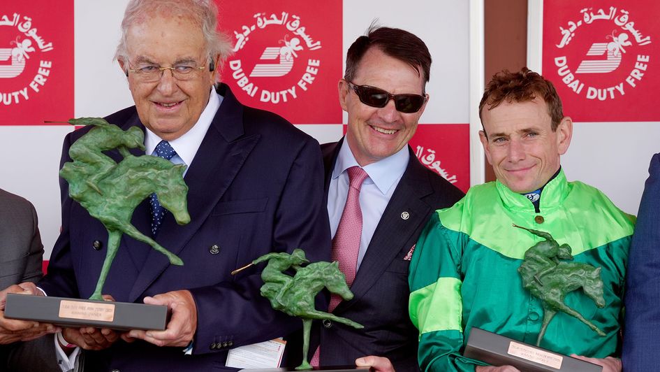 Jockey Ryan Moore (right), trainer Aidan O'Brien (centre), and owner John Magnier (left)