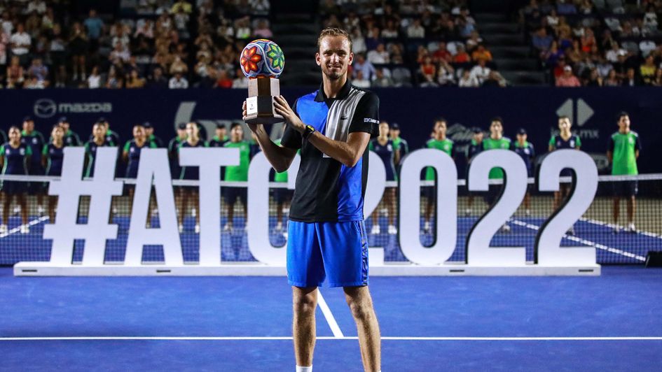 Daniil Medvedev celebrates with the trophy