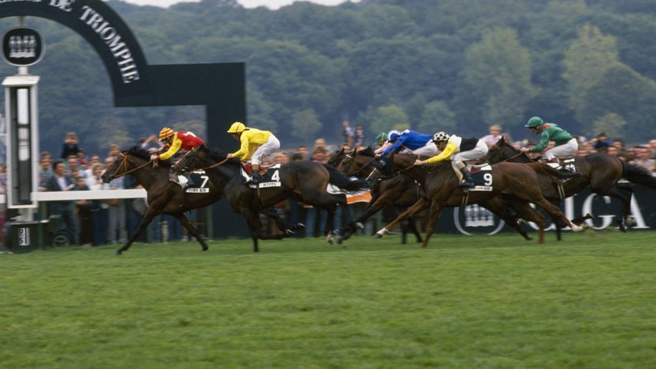 Unfuwain (blue silks) finishes fourth in the Arc