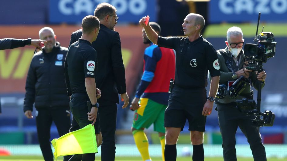 Mike Dean shows Slaven Bilic a red card at half-time