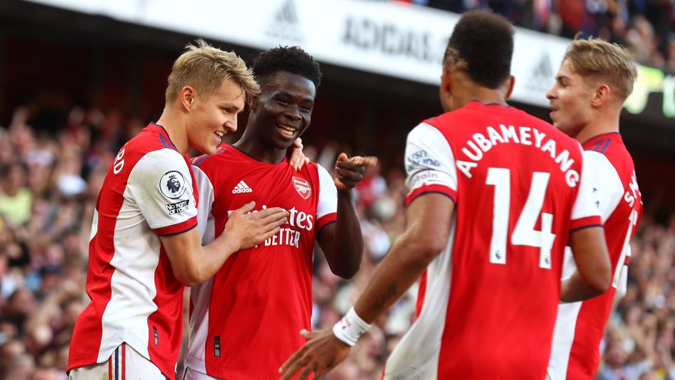 Arsenal celebrate a convincing win in the North London derby