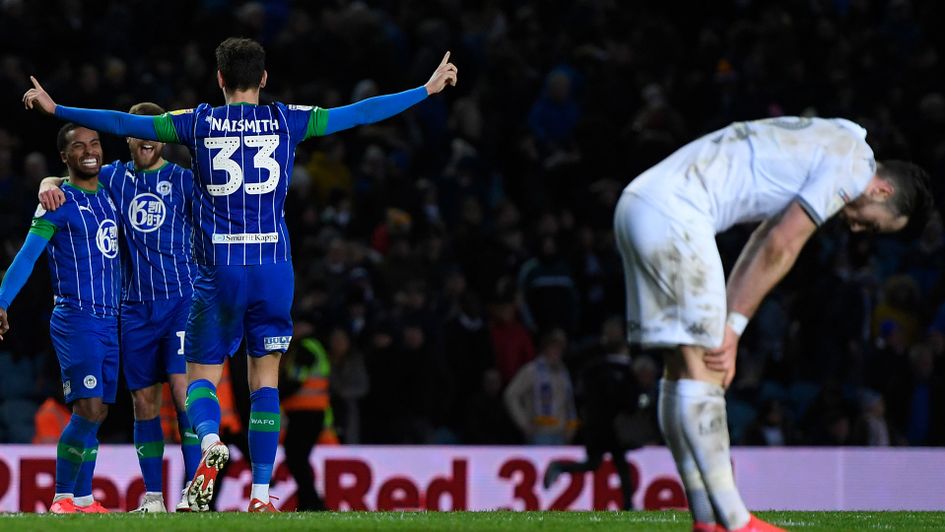 Wigan celebrate their shock win over Leeds at Elland Road