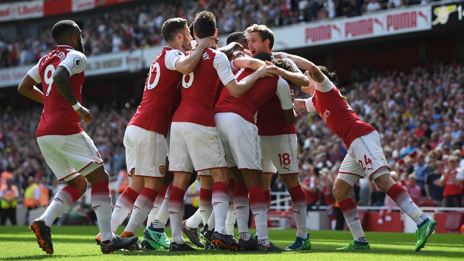 Arsenal players celebrate Nacho Monreal's goal
