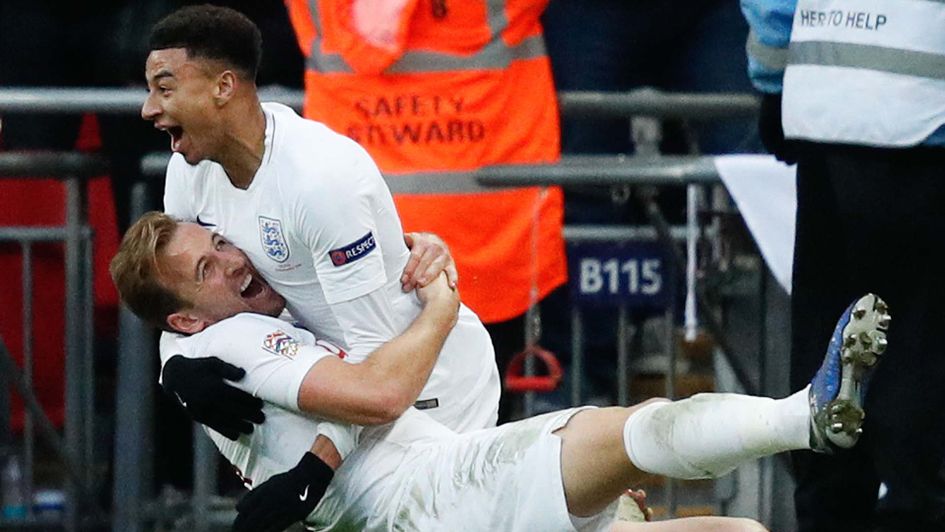 Harry Kane and Jesse Lingard celebrate scoring for England against Croatia at Wembley