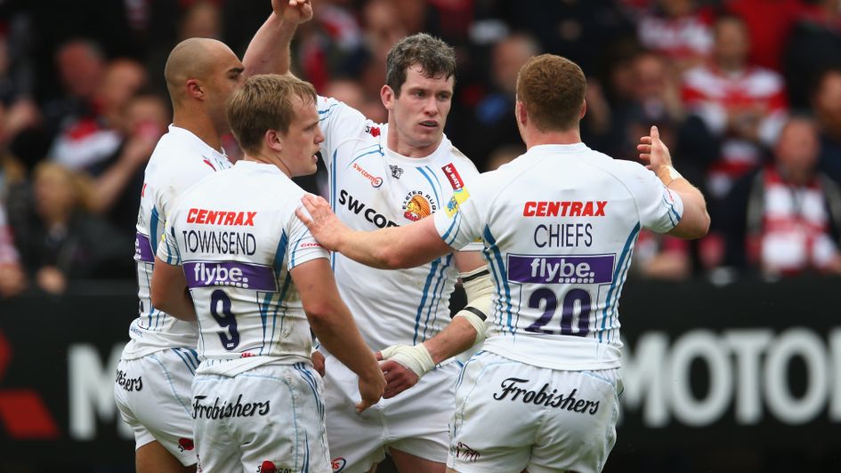 Ian Whitten celebrates his try