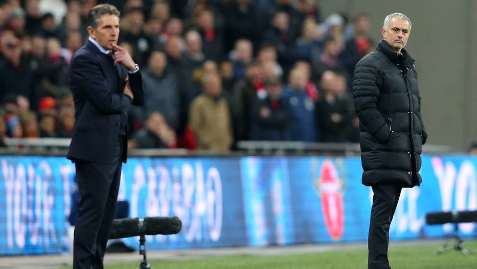 Claude Puel (left) watches his Southampton side in action in the EFL Cup final