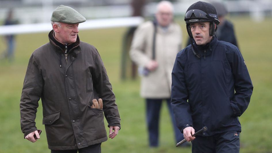 Willie Mullins and Ruby Walsh walking the course