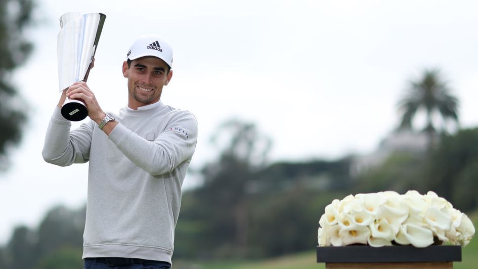 Joaquin Niemann with the Genesis Invitational trophy