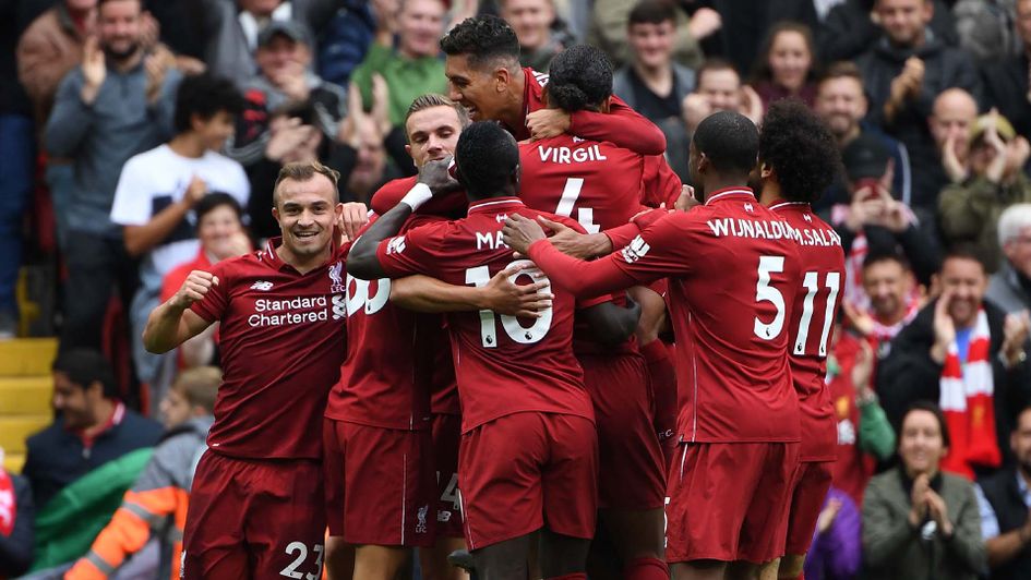 Liverpool players celebrate a goal against Southampton at Anfield