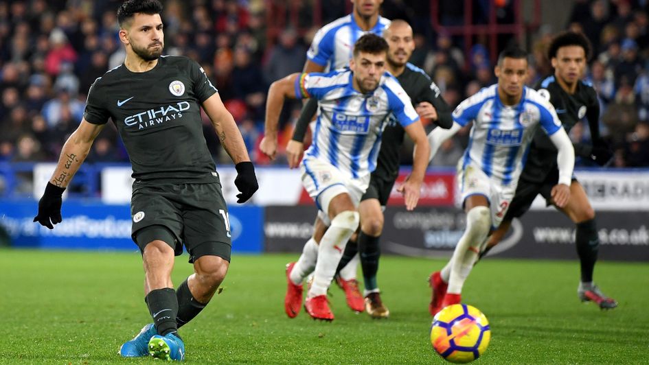 Sergio Aguero equalises from the spot
