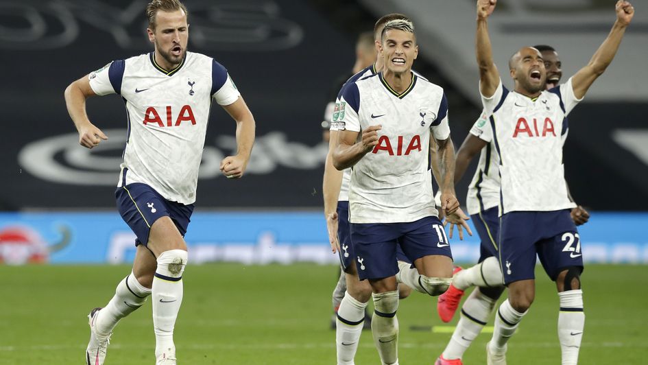 Tottenham players celebrate beating Chelsea on penalties