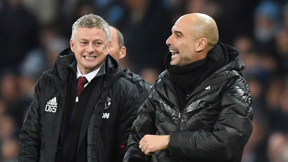 Ole Gunnar Solskjaer and Pep Guardiola during the Manchester derby